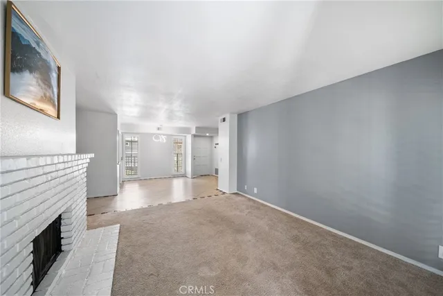 a view of a livingroom with a fireplace