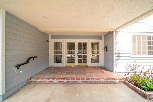 a view of front door of house with an outdoor space