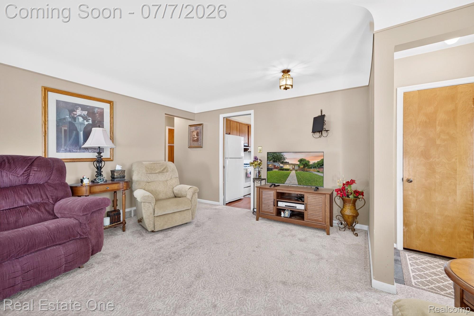 24749 Munson Street Taylor, MI 48180 - Photo 6 of 28 Neutral tone walls with white trim throughout