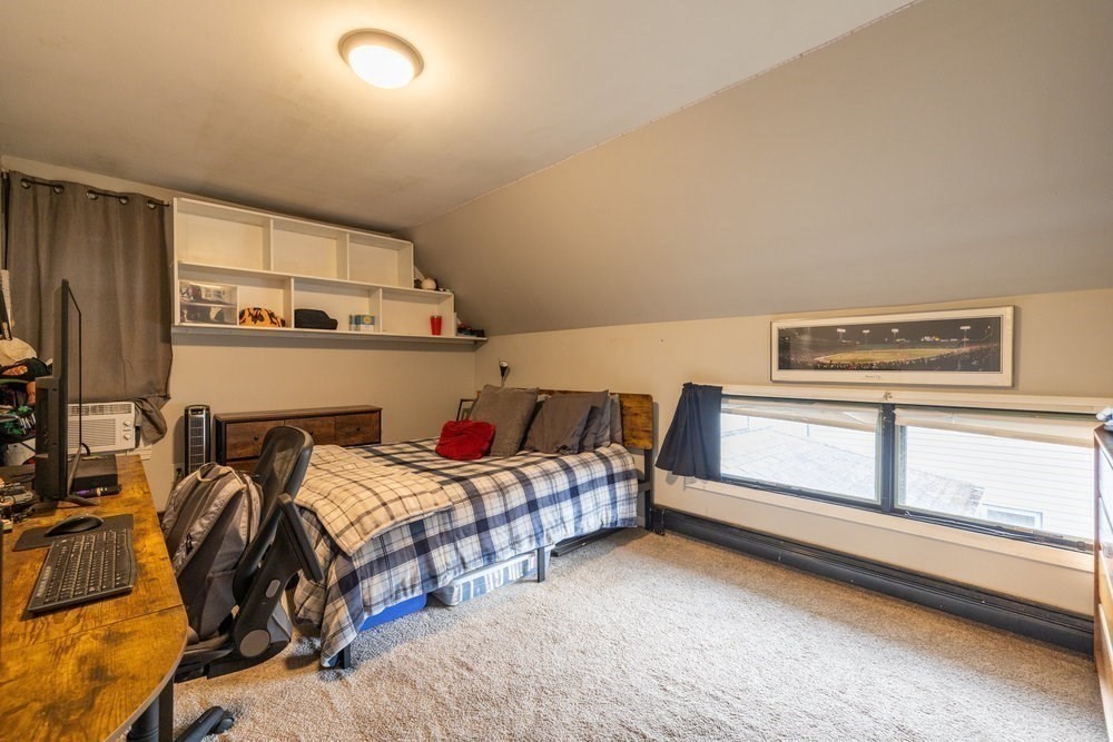 54-56 Stetson Street Whitman, MA 02382 - Photo 11 of 42 a bedroom with two beds and a window