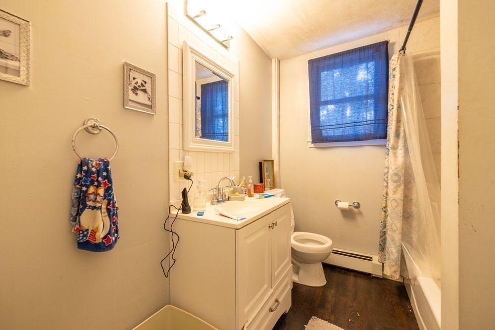 54-56 Stetson Street Whitman, MA 02382 - Photo 26 of 42 a bathroom with a sink toilet and shower