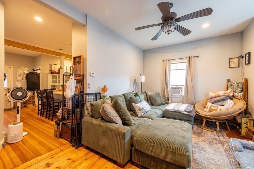 54-56 Stetson Street Whitman, MA 02382 - Photo 9 of 42 a living room with furniture and a view of bedroom