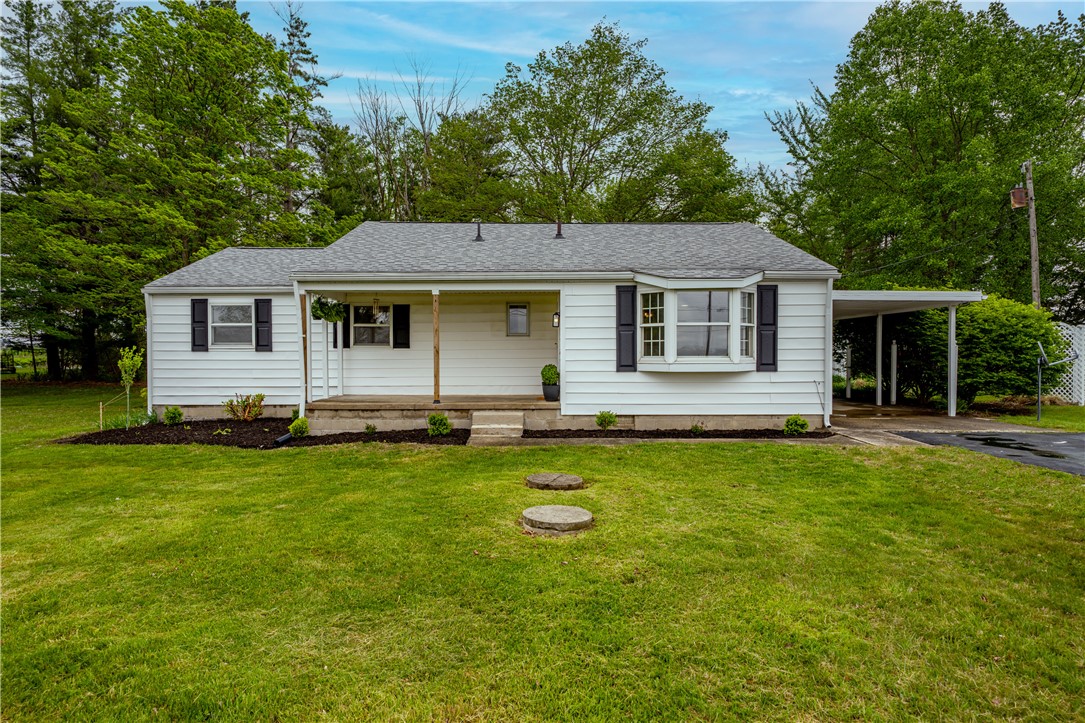 11296 Pansing Road Brookville, OH 45309 - Photo 1 of 53 This charming residence features a well-maintained exterior, welcoming porch, and ample green space.