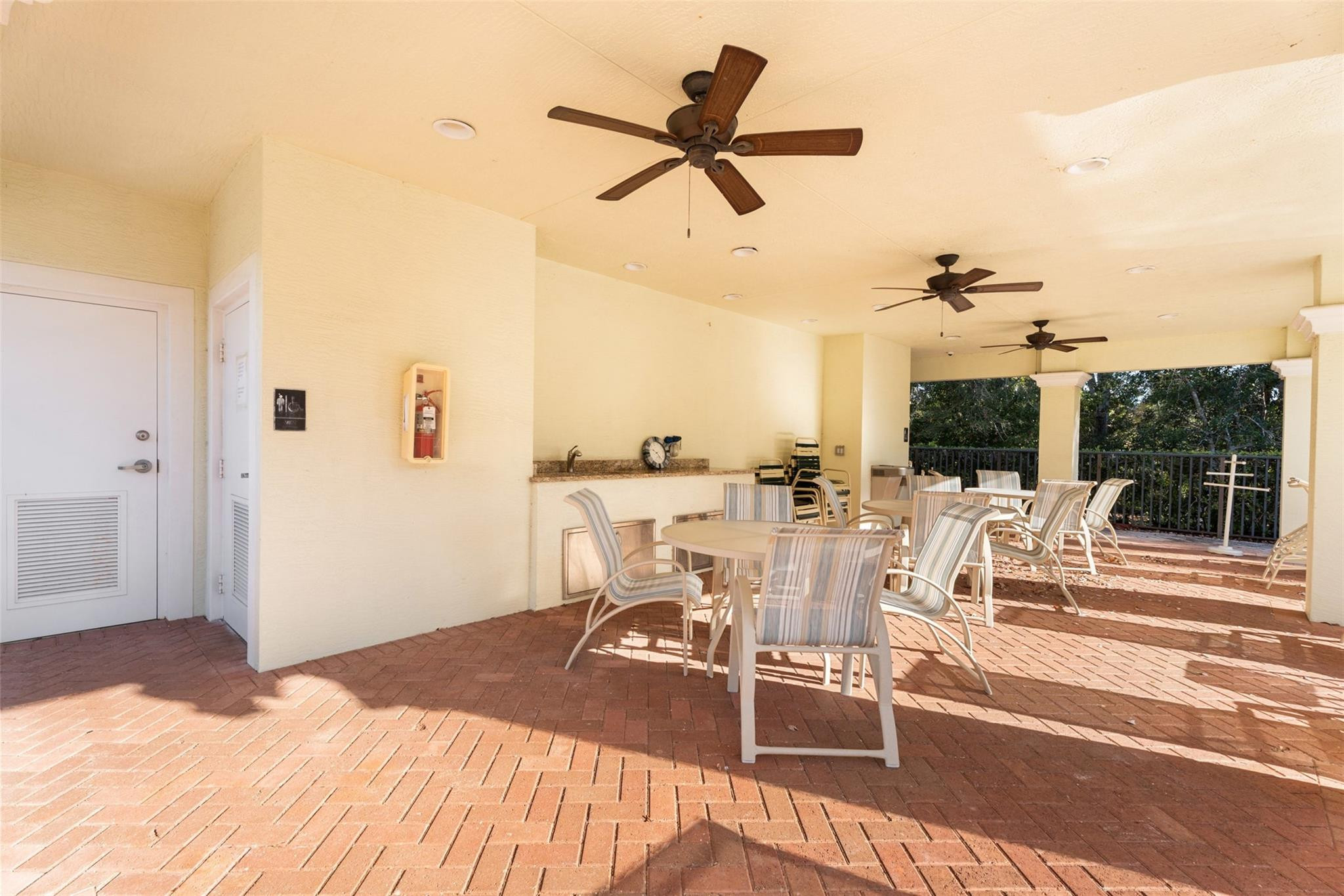 651 Southwest Glen Crest Way, Unit 2 Stuart, FL 34997 - Photo 36 of 41 a view of a living room and a floor to ceiling window