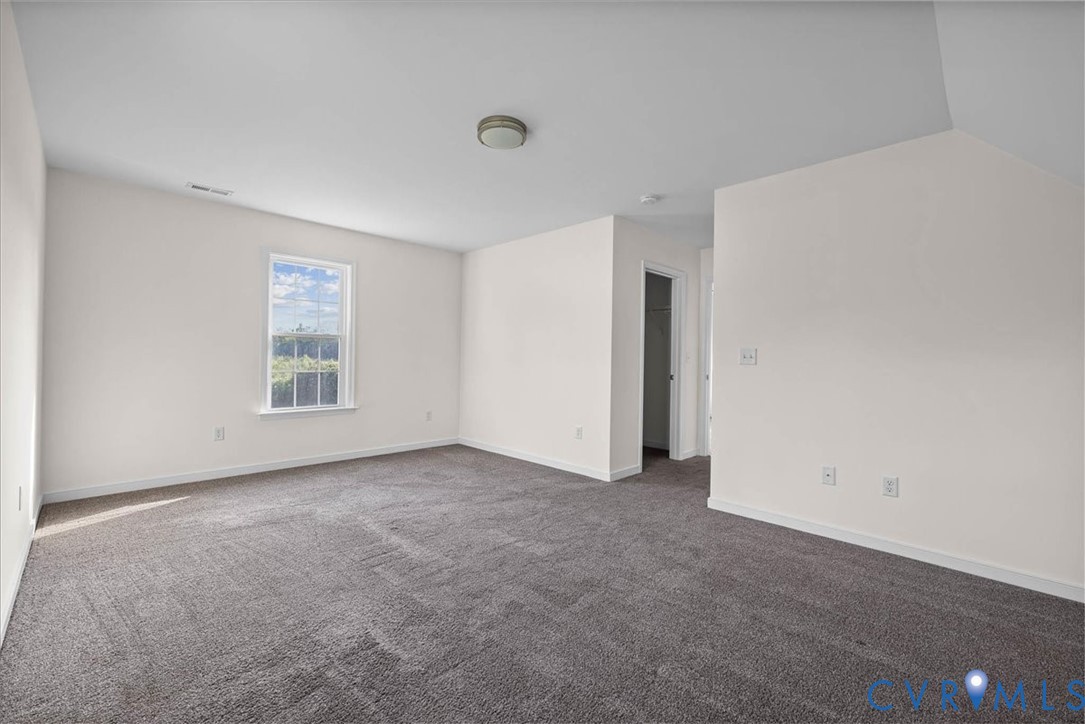 11325 Webb Road Disputanta, VA 23842 - Photo 26 of 32 Carpeted spare room with baseboards