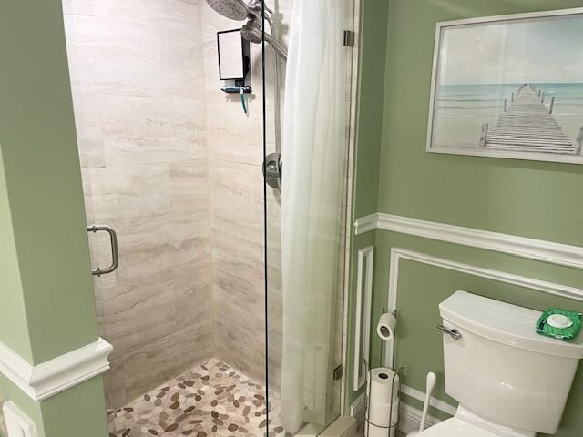 500 Ocean Trail Way, Unit 204 Jupiter, FL 33477 - Photo 15 of 40 a bathroom with a toilet and a shower