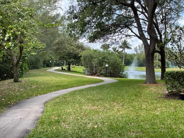 500 Ocean Trail Way, Unit 204 Jupiter, FL 33477 - Photo 24 of 40 a view of a garden with trees