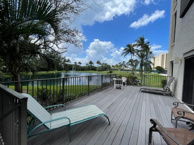 500 Ocean Trail Way, Unit 204 Jupiter, FL 33477 - Photo 25 of 40 a view of a balcony with wooden floor and lake view