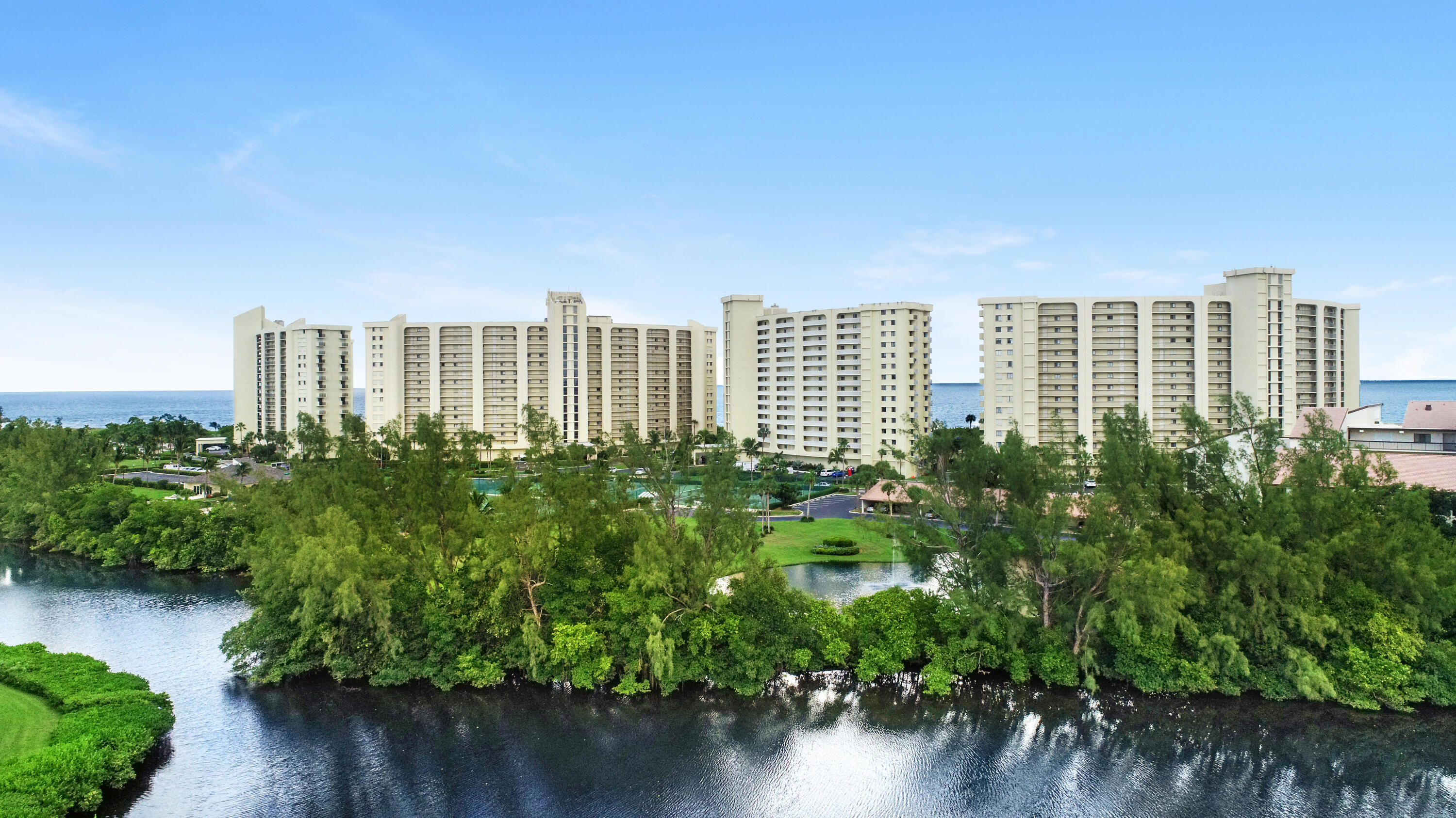 500 Ocean Trail Way, Unit 204 Jupiter, FL 33477 - Photo 32 of 40 a view of a city with tall buildings in front of it