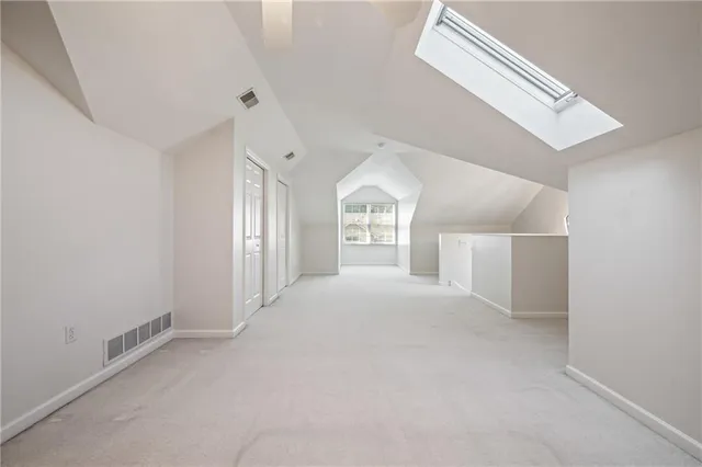 a view of empty room with windows