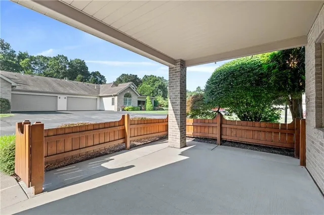 a view of a two chairs in the roof deck