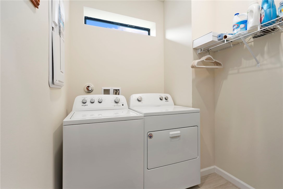 5208 Unity Square Vero Beach, FL 32967 - Photo 26 of 34 a utility room with dryer and washer