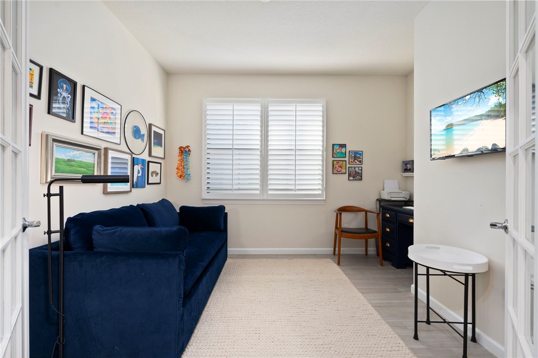 5208 Unity Square Vero Beach, FL 32967 - Photo 6 of 34 a living room with furniture and a window