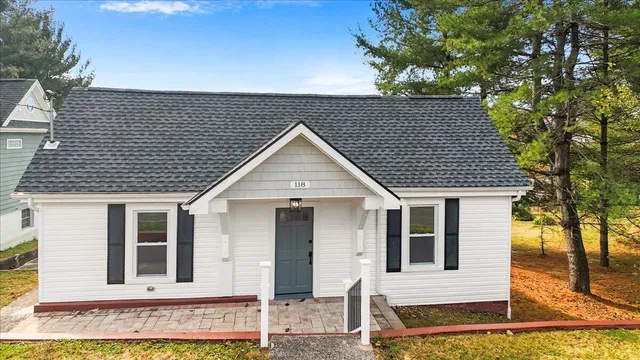 front view of a house with a yard