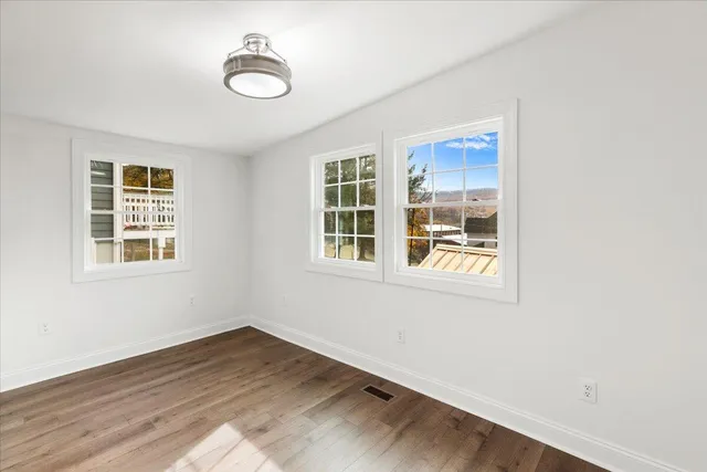 a view of a yard in front of a house