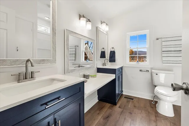 a backyard of a house with wooden fence and porch
