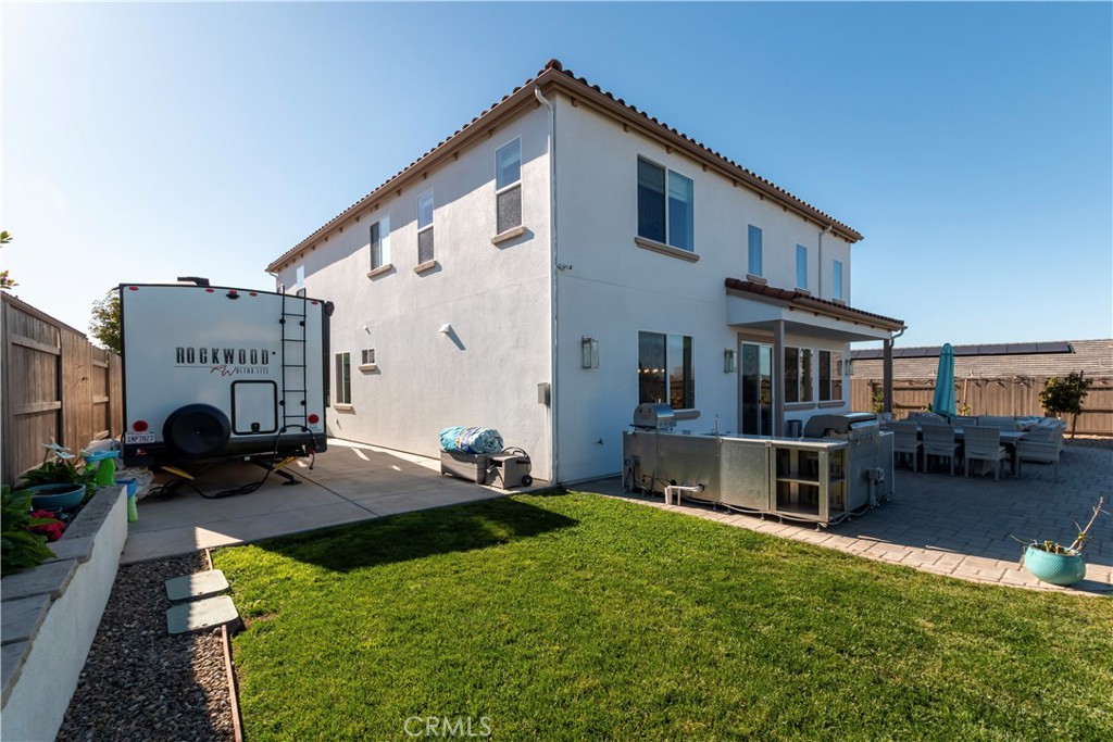 1275 Grand Meadow Way Santa Maria, CA 93455 - Photo 22 of 66 a view of house with yard and furniture