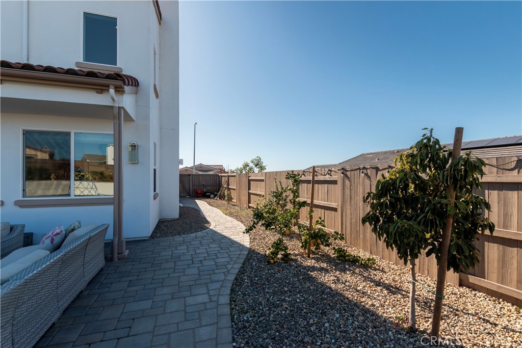 1275 Grand Meadow Way Santa Maria, CA 93455 - Photo 23 of 66 a view of a balcony with chairs and potted plants