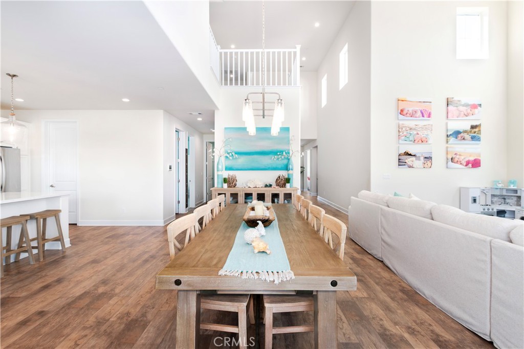 1275 Grand Meadow Way Santa Maria, CA 93455 - Photo 38 of 66 a living room with furniture a window and wooden floor