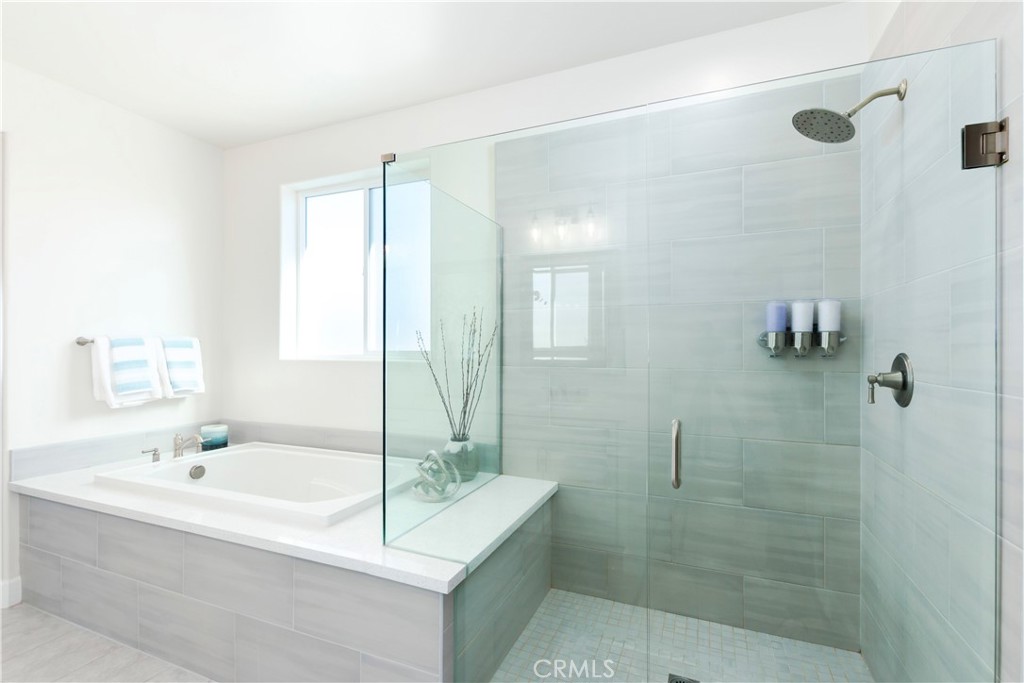 1275 Grand Meadow Way Santa Maria, CA 93455 - Photo 49 of 66 a bathroom with a bathtub and a sink