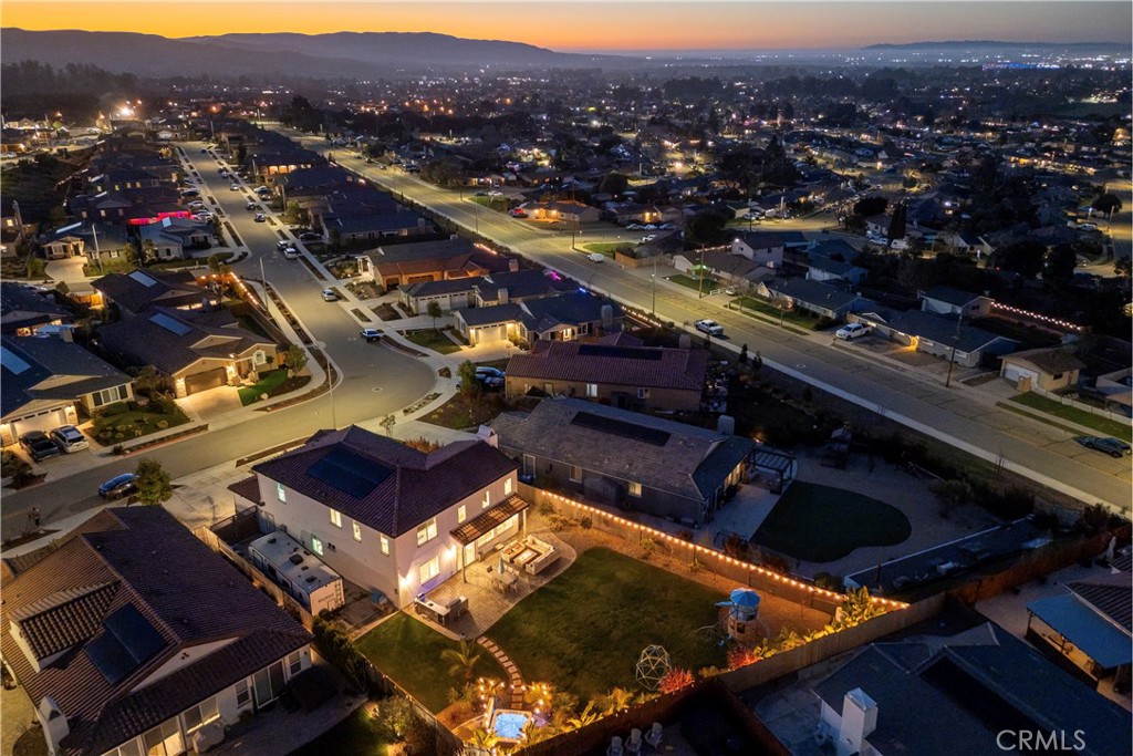 1275 Grand Meadow Way Santa Maria, CA 93455 - Photo 7 of 66 an aerial view of residential houses and city street