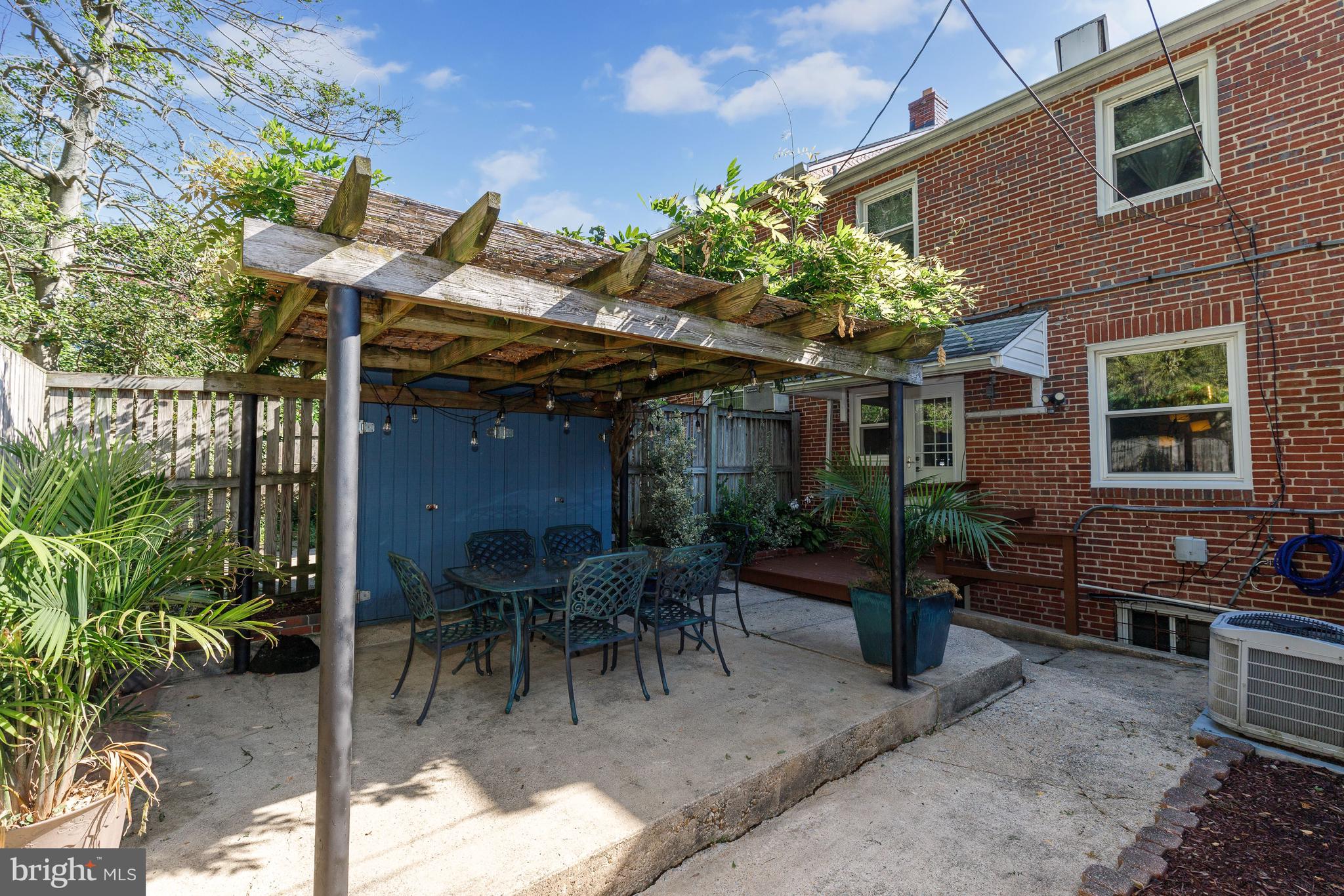 3908 Rexmere Road Baltimore, MD 21218 - Photo 26 of 39 a patio with table and chairs