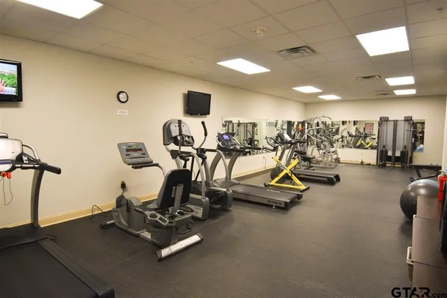 a view of a room with gym equipment