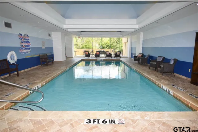 a view of a living room and a wooden floor