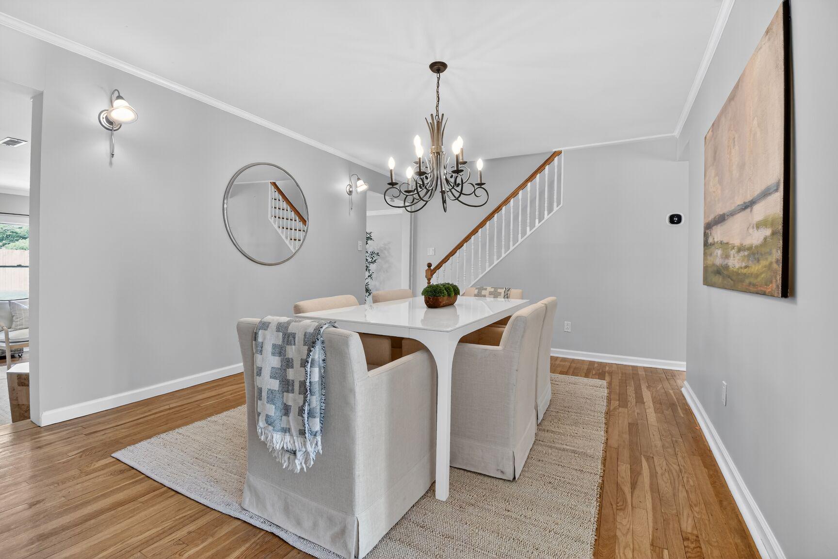 820 Brice Road Rockville, MD 20852 - Photo 10 of 26 Elegant dining space with cozy charm.