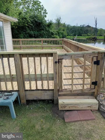 a view of a backyard with a deck