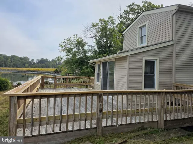 a balcony view with a lake view