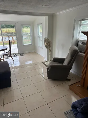 a bathroom with a shower and a mirror