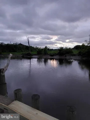 a view of a lake with a mountain in the background
