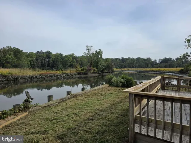 a workspace with furniture and a fireplace