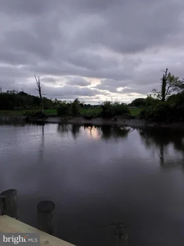 a patio with table and chairs