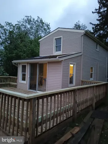 a balcony view with a seating space