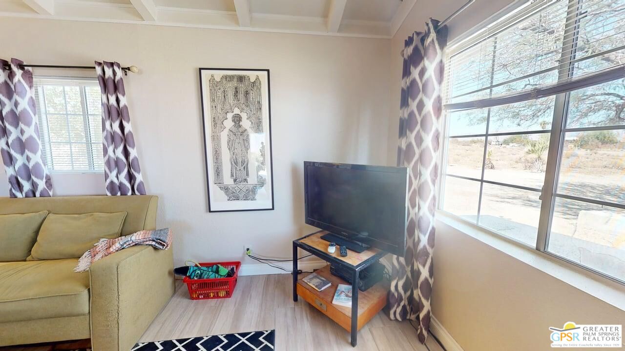 14701 Old Morongo Road Whitewater, CA 92282 - Photo 25 of 70 a living room with furniture and a flat screen tv