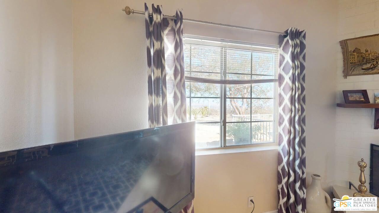 14701 Old Morongo Road Whitewater, CA 92282 - Photo 27 of 70 a view of an empty room with a window
