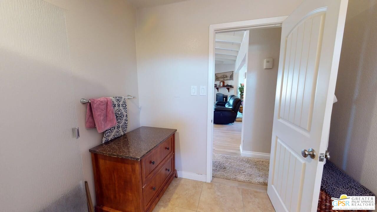 14701 Old Morongo Road Whitewater, CA 92282 - Photo 44 of 70 a hallway with storage and utility