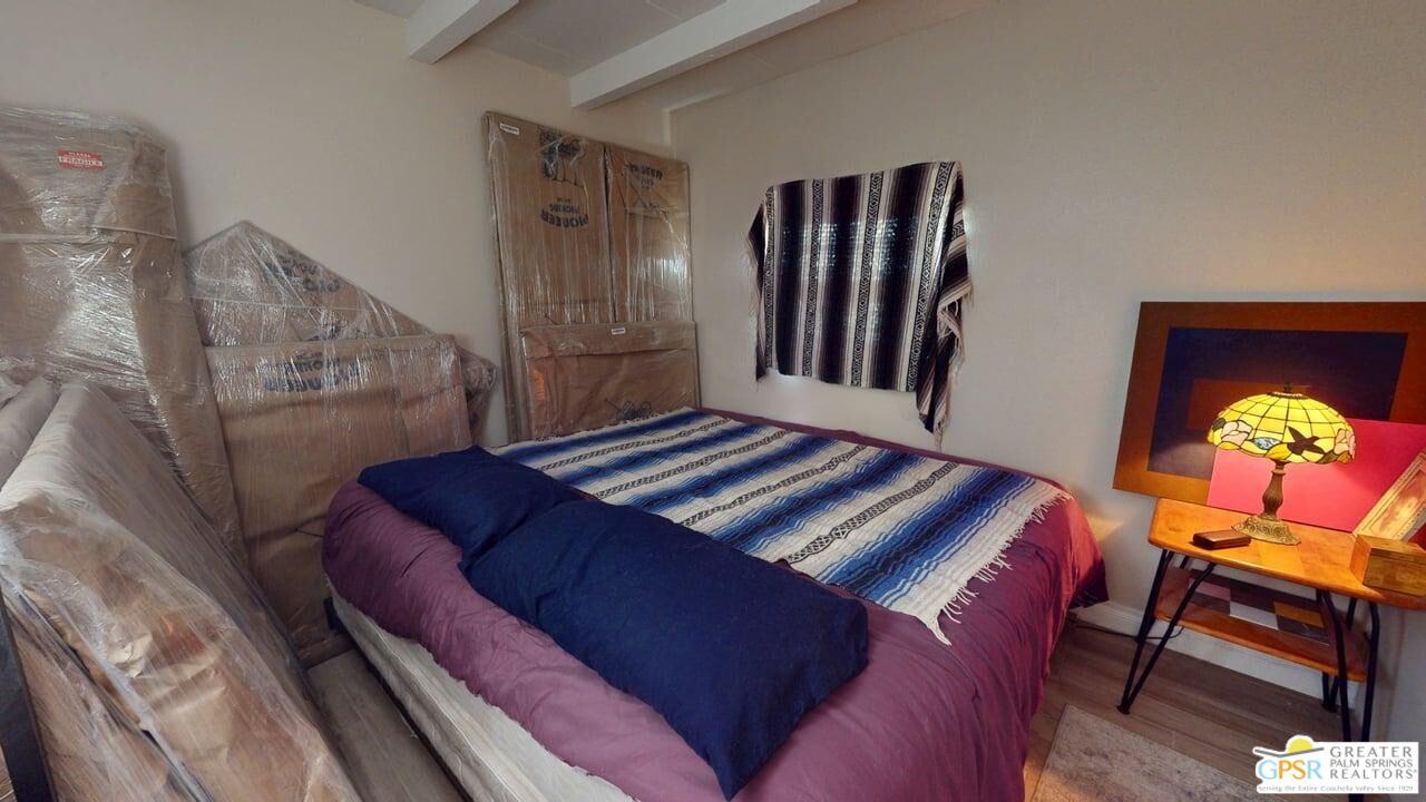 14701 Old Morongo Road Whitewater, CA 92282 - Photo 45 of 70 a bedroom with a bed and a dresser in it