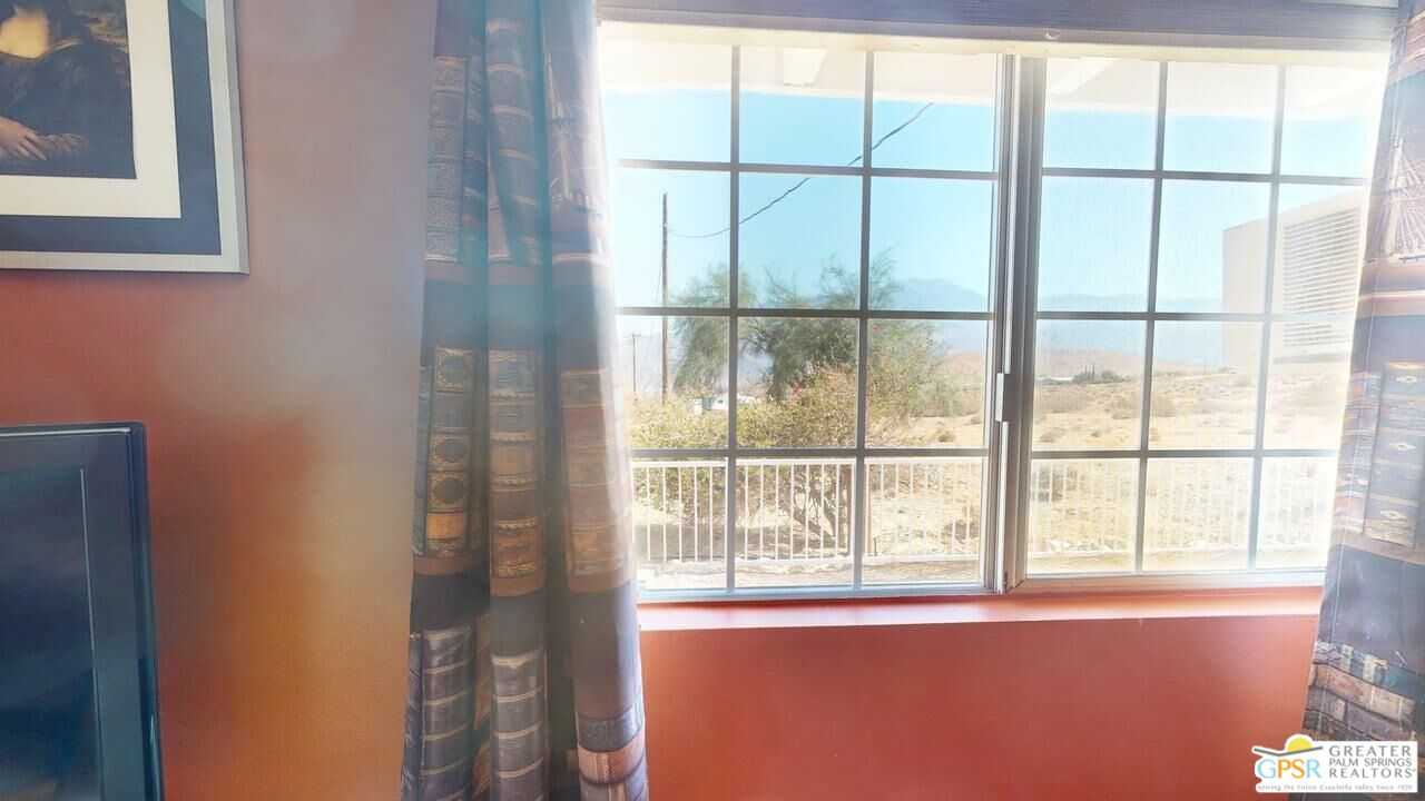14701 Old Morongo Road Whitewater, CA 92282 - Photo 55 of 70 a view of an empty room with a window