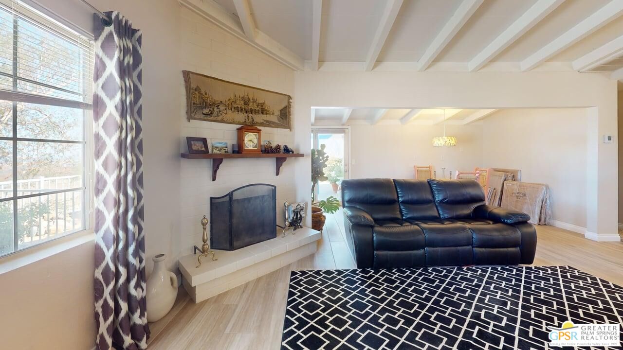 14701 Old Morongo Road Whitewater, CA 92282 - Photo 8 of 70 a living room with furniture and a fireplace