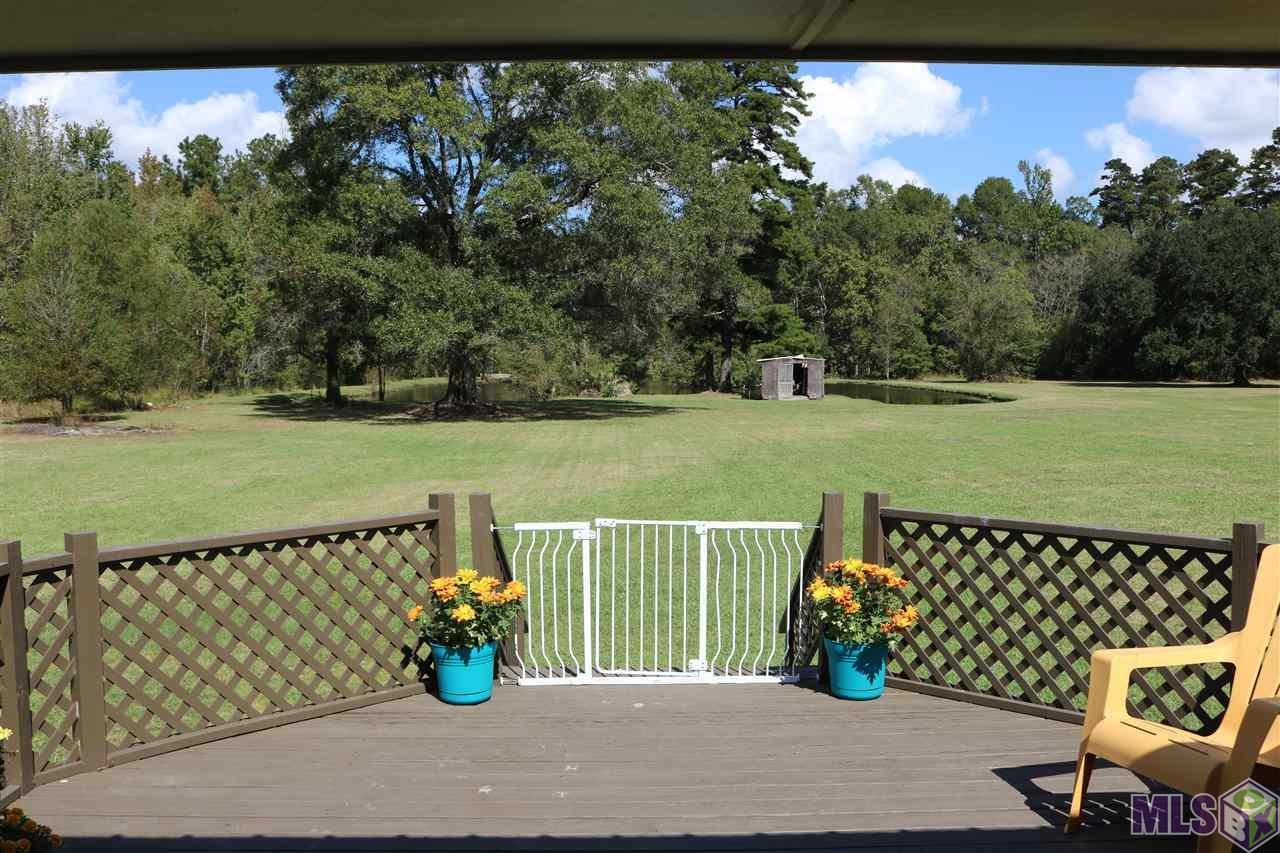 8901 Arnold Road Denham Springs, LA 70726 - Photo 18 of 23 View from Back Patio and Den