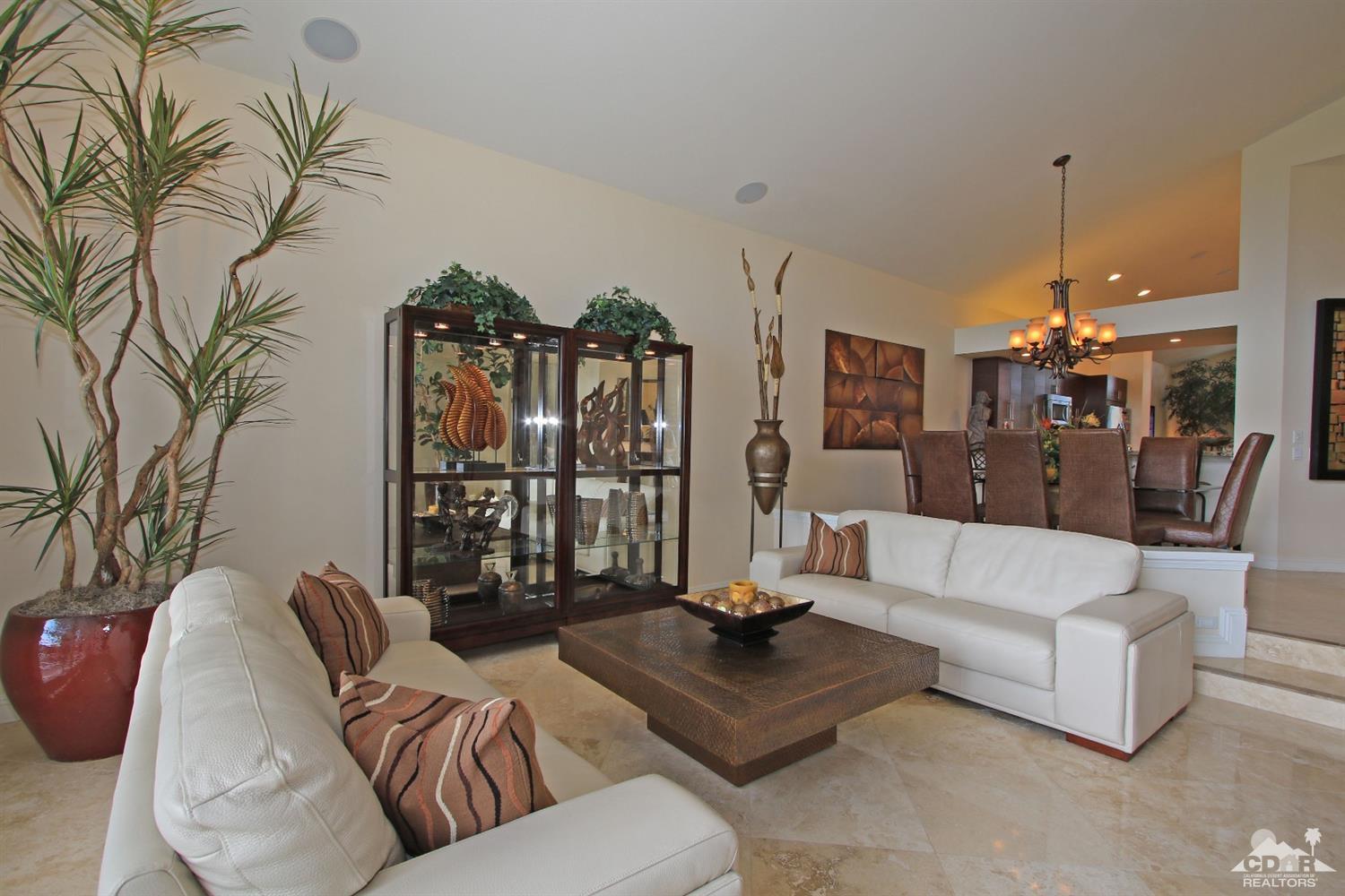 326 Red River Road Palm Desert, CA 92211 - Photo 12 of 54 a living room with furniture and a chandelier