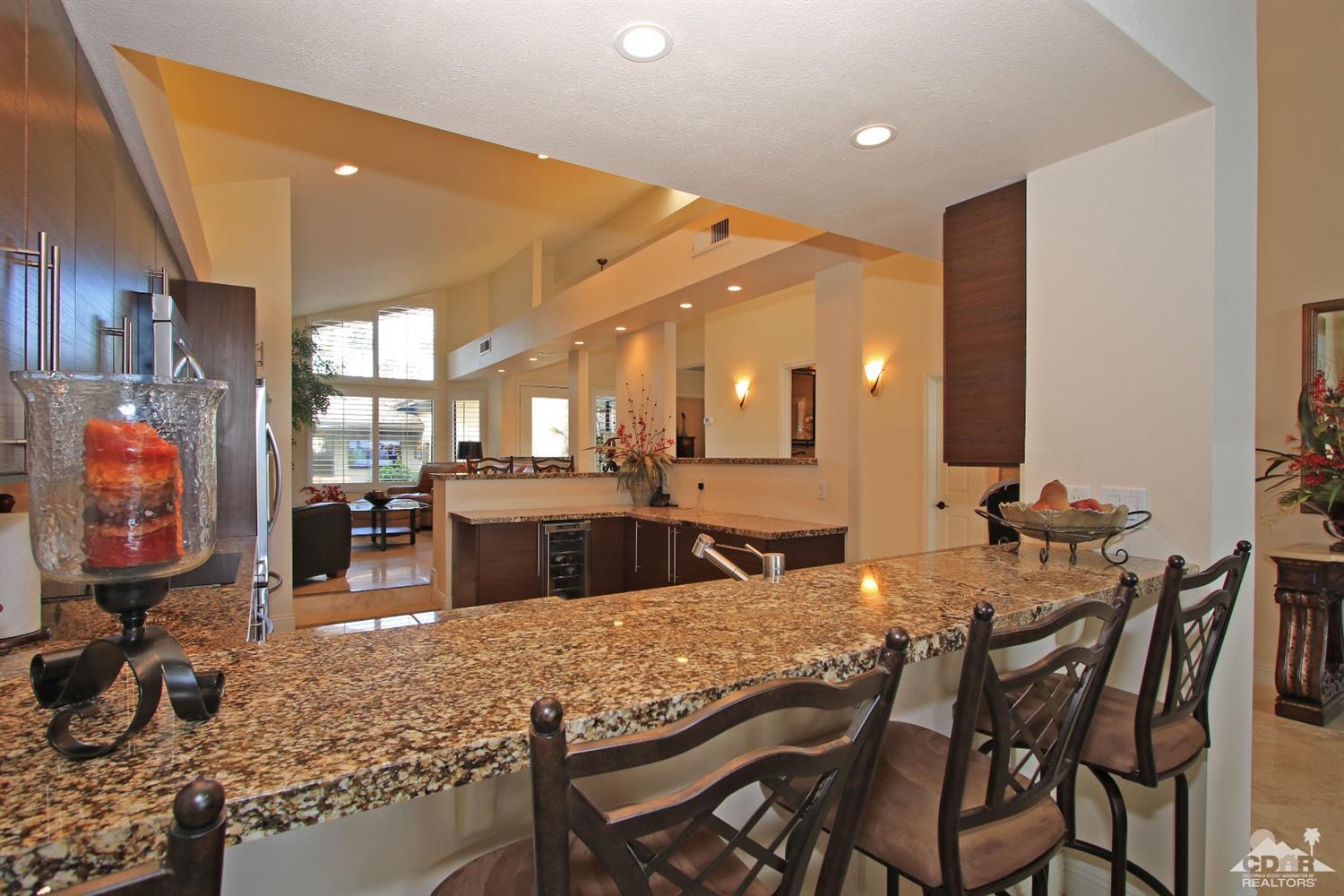 326 Red River Road Palm Desert, CA 92211 - Photo 15 of 54 a view of a dining room with furniture