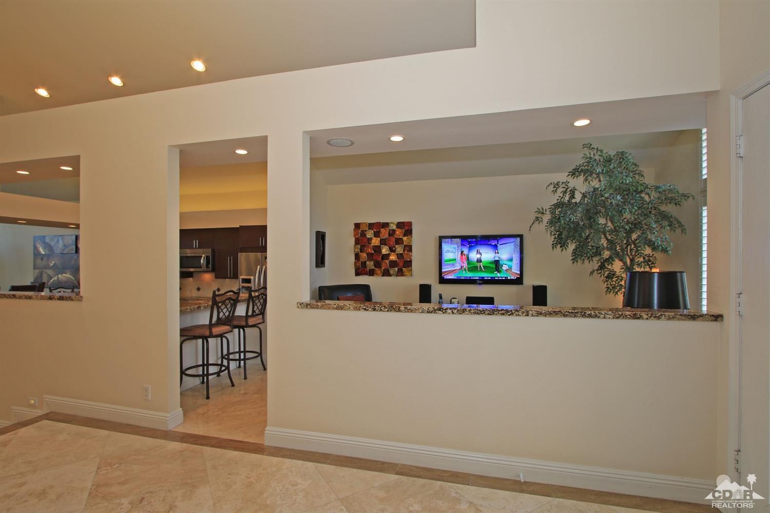 326 Red River Road Palm Desert, CA 92211 - Photo 24 of 54 wooden floor and windows in a room