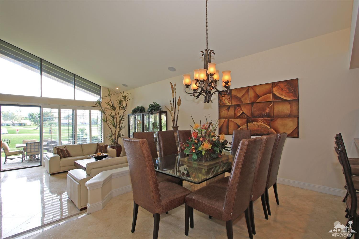 326 Red River Road Palm Desert, CA 92211 - Photo 26 of 54 a dining room with furniture a chandelier and window