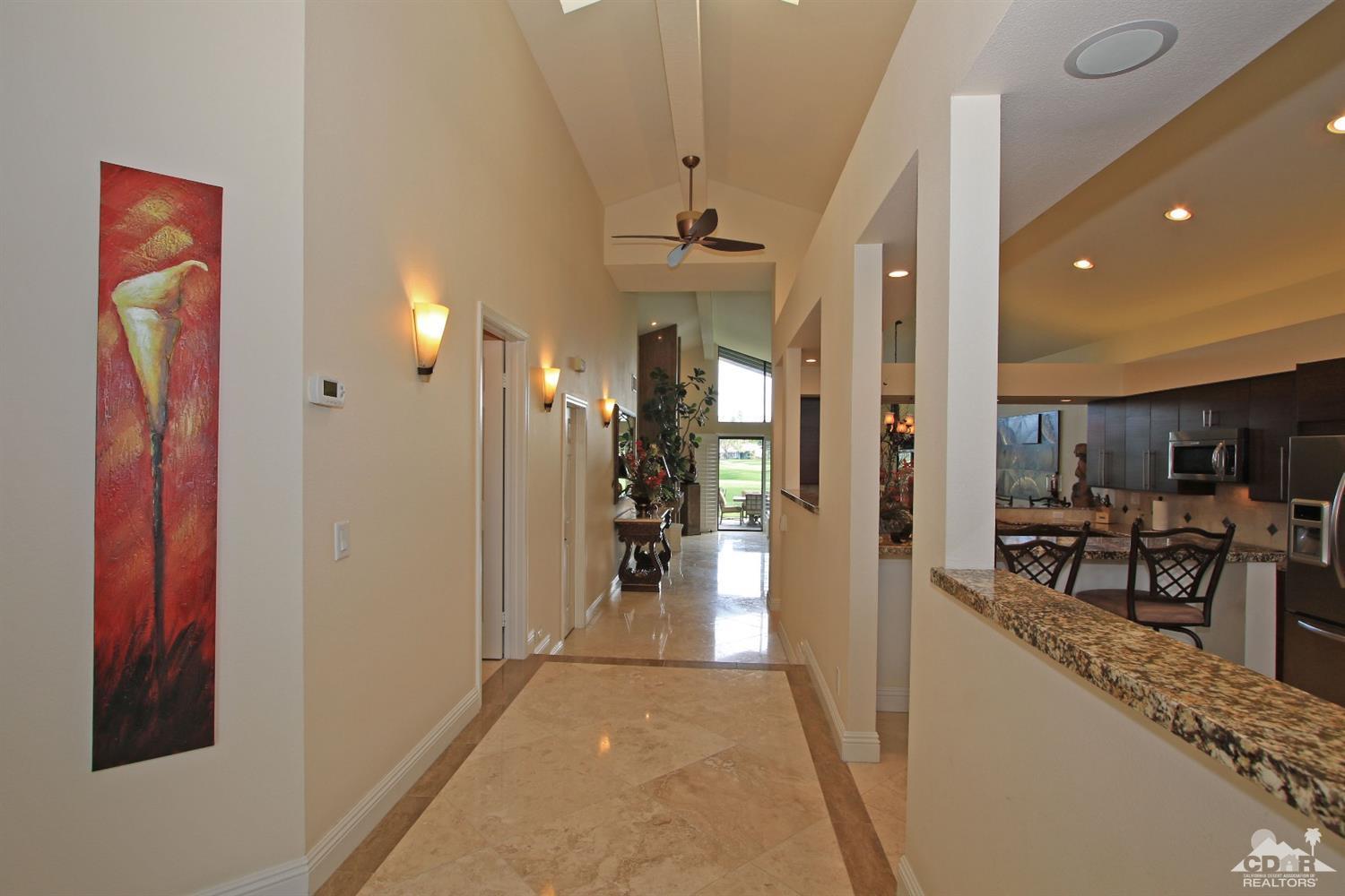 326 Red River Road Palm Desert, CA 92211 - Photo 32 of 54 a view of a hallway view with living room and dining room