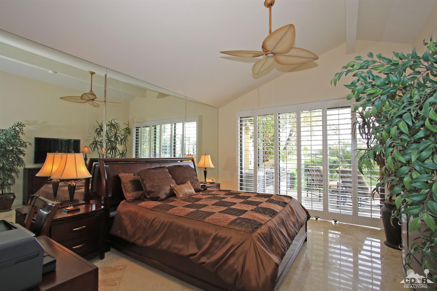 326 Red River Road Palm Desert, CA 92211 - Photo 33 of 54 a bedroom with a bed and window