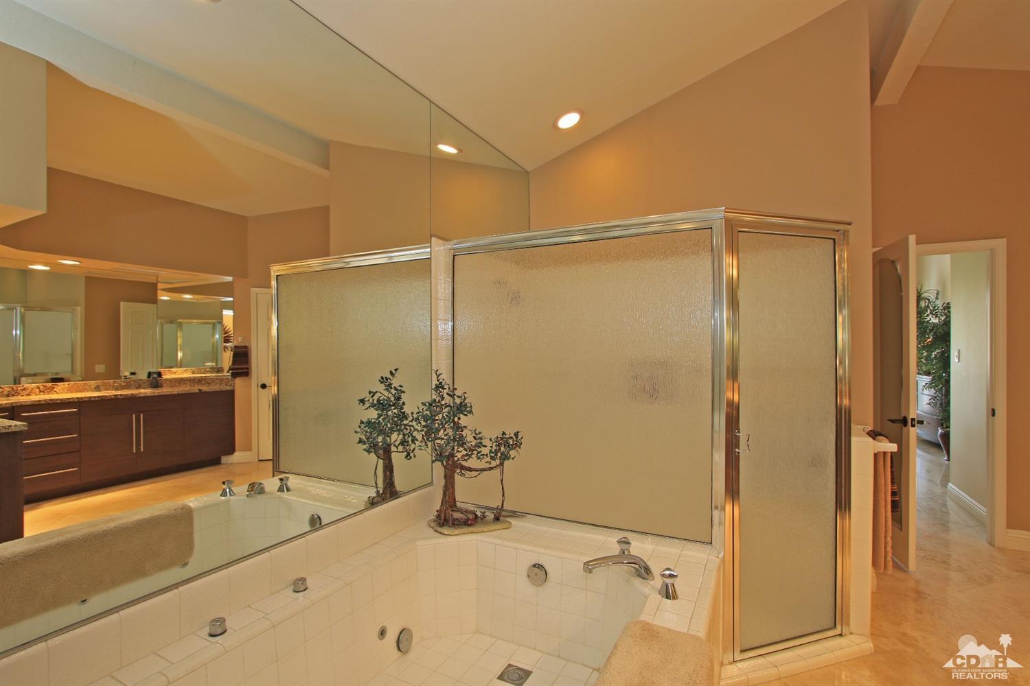 326 Red River Road Palm Desert, CA 92211 - Photo 36 of 54 a bathroom with a tub and shower